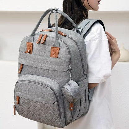 maman et son sac à dos à langer intérieur lumineux