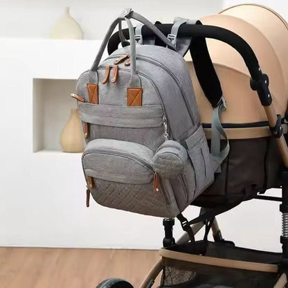 sac à dos à langer sur la poussette